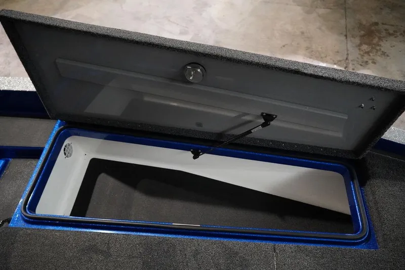 Slide: The Image of Open storage compartment of 2020 Caymas CX 20 PRO boat. - 9