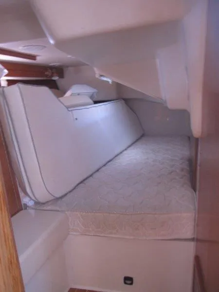 Slide: The Image of 2007 Catalina MkII interior cabin with bed and cushions. - 15