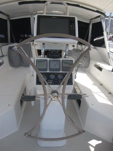 Slide: The Image of 2007 Catalina MkII yacht cockpit with steering wheel and navigation instruments. - 20