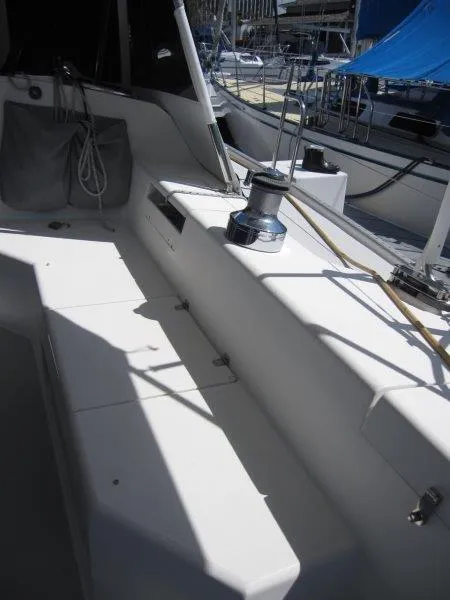 Slide: The Image of 2007 Catalina MkII sailboat cockpit with winch and seating area. - 22