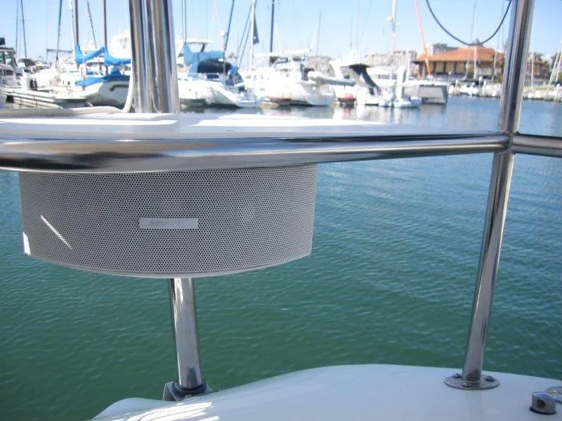 Slide: The Image of Speaker mounted on a 2007 Catalina MkII sailboat at a marina. - 28