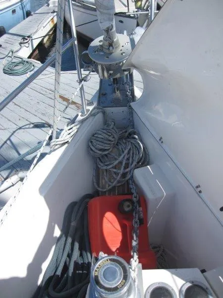 Slide: The Image of 2007 Catalina MkII sailboat bow with anchor chain, ropes, and red fuel container. - 30