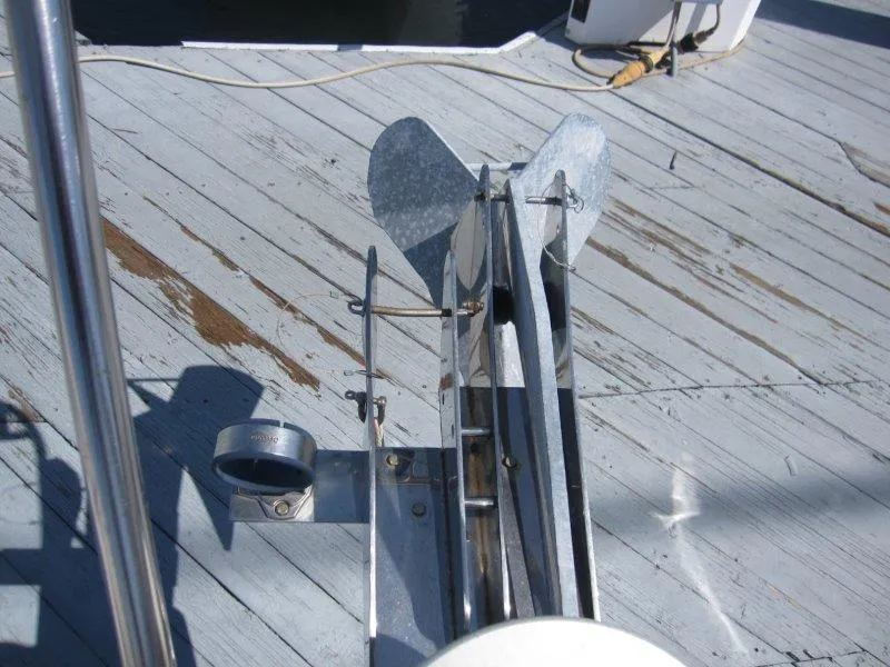 Slide: The Image of Catalina MkII 2007 boat anchor system on a wooden dock. - 31