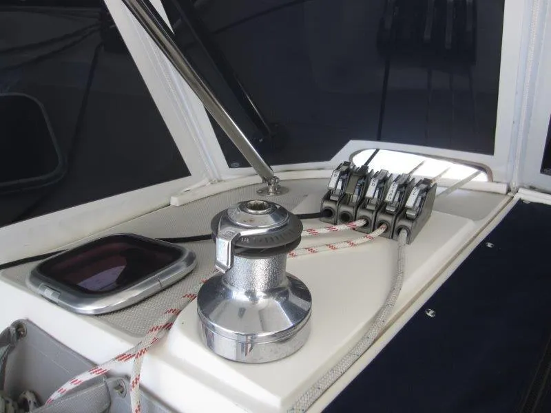 Slide: The Image of 2007 Catalina MkII sailboat deck with winch and rope clutches. - 40