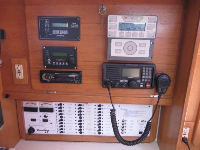 Slide: The Image of Control panel of a 2007 Catalina MkII sailboat with navigation and communication equipment. - 8