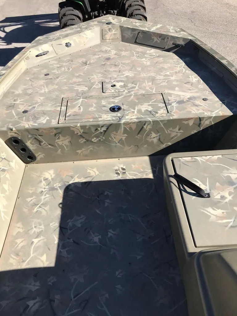 Slide: The Image of 2024 Tracker Grizzly 1754 SC boat with camouflage deck design. - 10