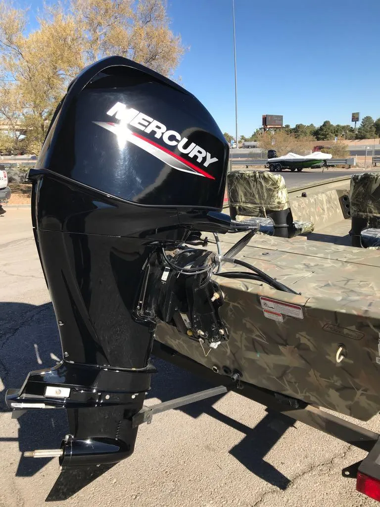 Slide: The Image of 2024 Tracker Grizzly 1754 SC boat with Mercury outboard motor. - 4