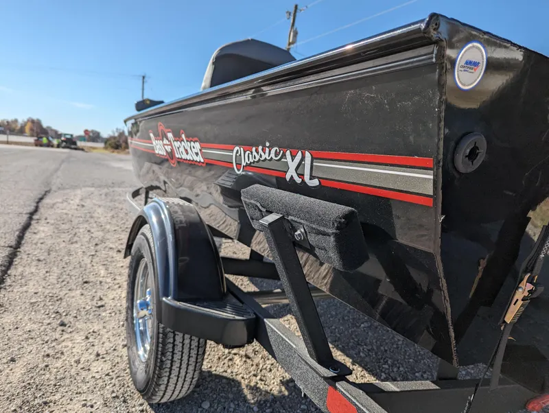 Slide: The Image of 2024 Tracker Bass Tracker Classic XL boat on a trailer. - 4