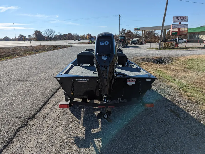 Slide: The Image of 2024 Tracker Bass Tracker Classic XL boat with 50 HP motor on a trailer. - 5