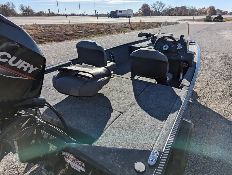 Slide: The Image of 2024 Tracker Bass Tracker Classic XL fishing boat with Mercury outboard motor. - 7