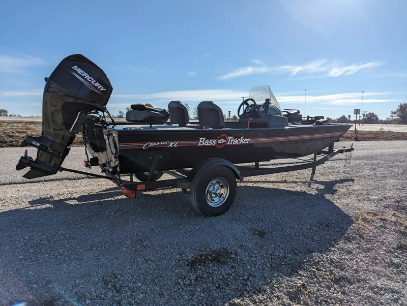 Slide: The Image of 2024 Tracker Bass Tracker Classic XL fishing boat with Mercury outboard motor. - 8