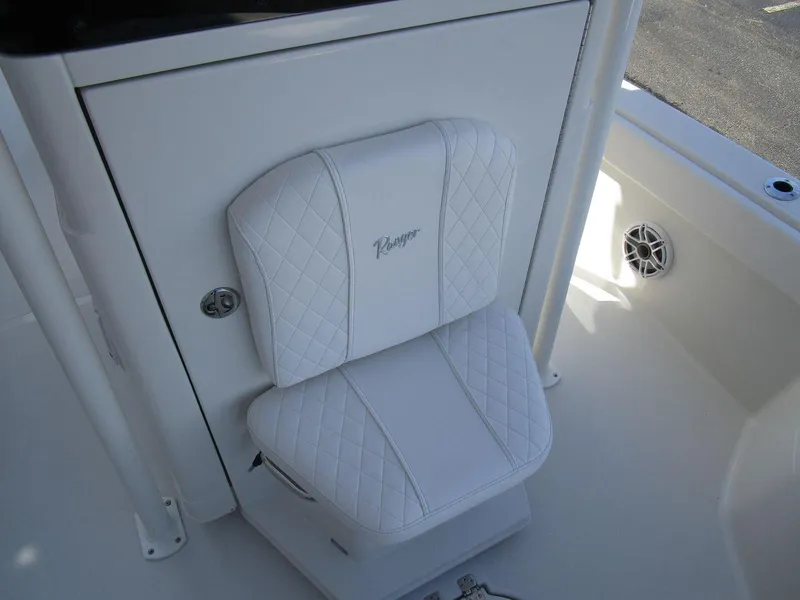 Slide: The Image of 2024 Ranger 2660 Bay boat seat with white quilted upholstery. - 14