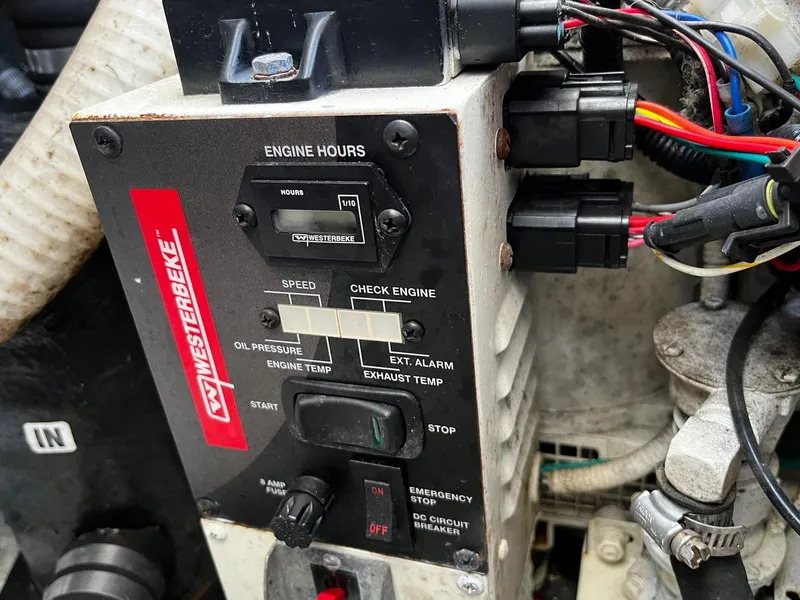 Slide: The Image of Control panel of a 2013 Chaparral 327 SSX boat with Westerbeke engine monitor. - 40