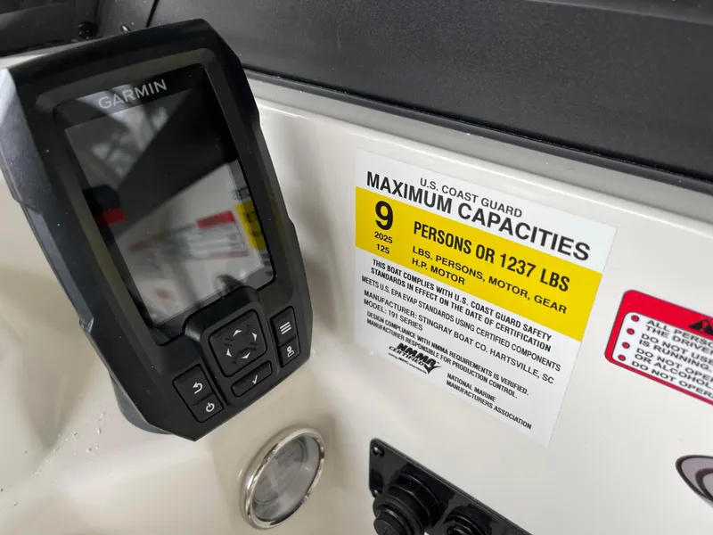 Slide: The Image of Garmin device and capacity label on 2024 Stingray 191 DC boat. - 20