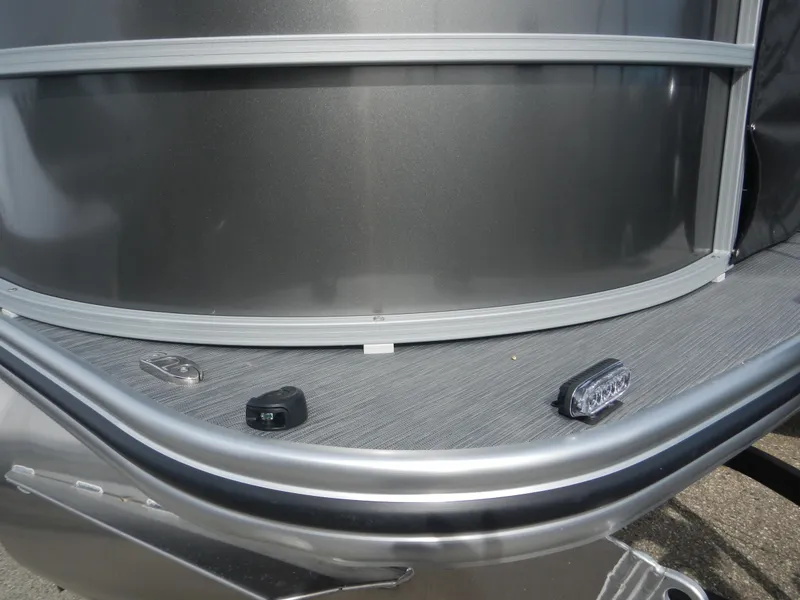 Slide: The Image of 2024 Lowe SF 212 WT pontoon boat deck and railing close-up. - 1