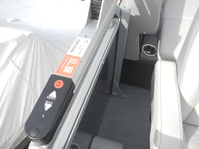 Slide: The Image of 2024 Lowe SF 212 WT boat interior with seating and control panel. - 20