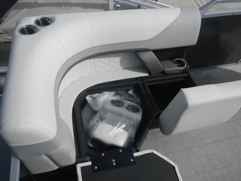 Slide: The Image of 2024 Lowe SF 212 WT boat interior seating with storage compartment. - 21