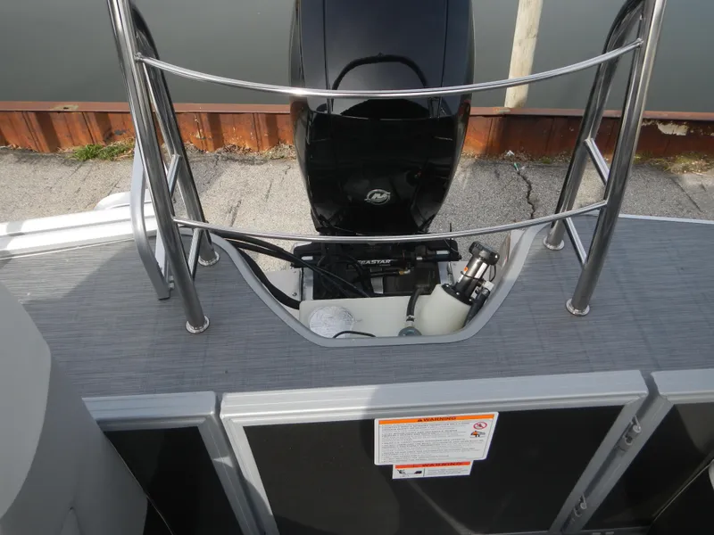 Slide: The Image of 2024 Lowe SF 212 WT boat stern with outboard motor. - 22