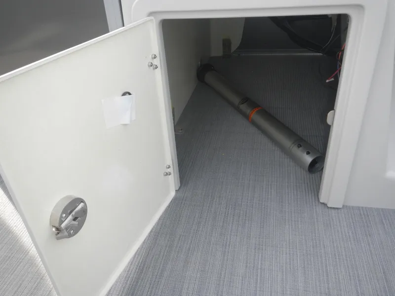 Slide: The Image of Open storage compartment in 2024 Lowe SF 212 WT boat. - 25