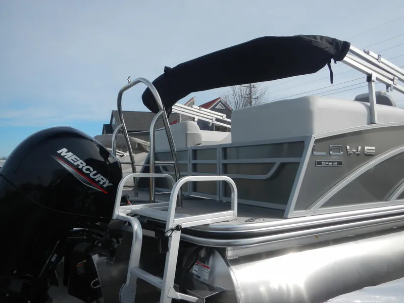 Slide: The Image of 2024 Lowe SF 212 WT pontoon boat with Mercury outboard motor. - 7