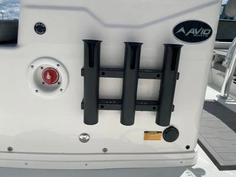 Slide: The Image of 2024 Avid 19FSX boat with rod holders and control panel. - 10