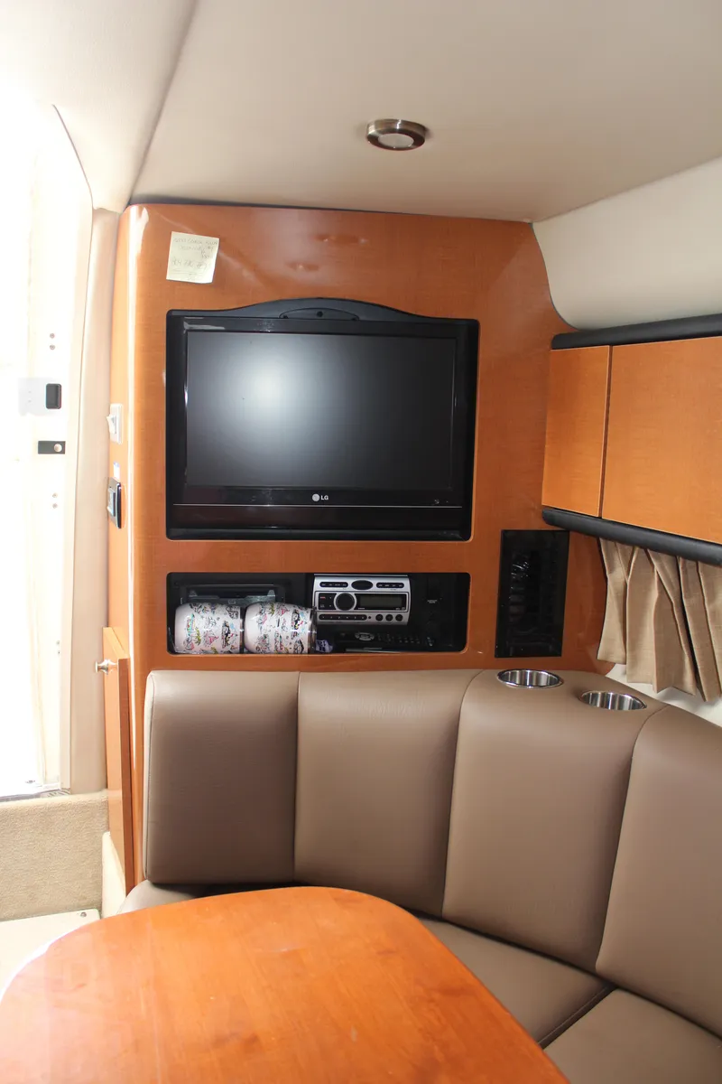 Slide: The Image of Interior of 2008 Chaparral Signature 290 with TV, stereo, and seating area. - 37