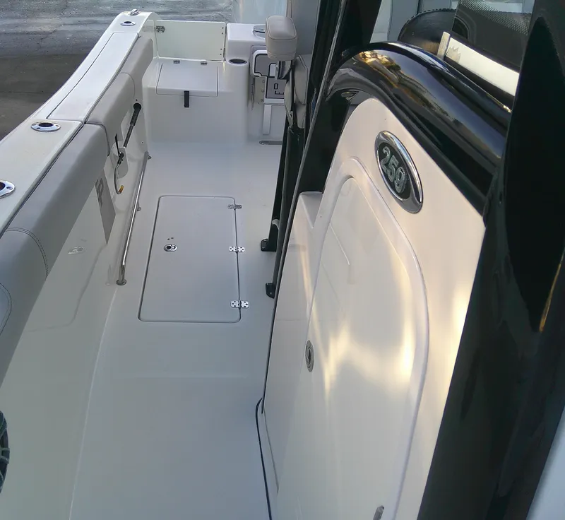 Slide: The Image of 2020 Sea Pro 259 Center Console boat interior, featuring sleek design and spacious layout. - 34