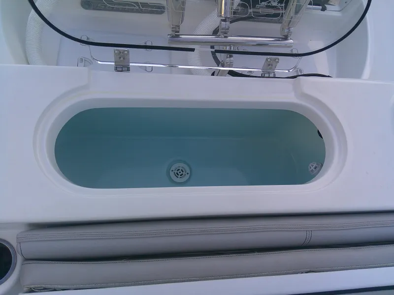 Slide: The Image of Livewell on 2020 Sea Pro 259 Center Console boat, open and filled with water. - 37
