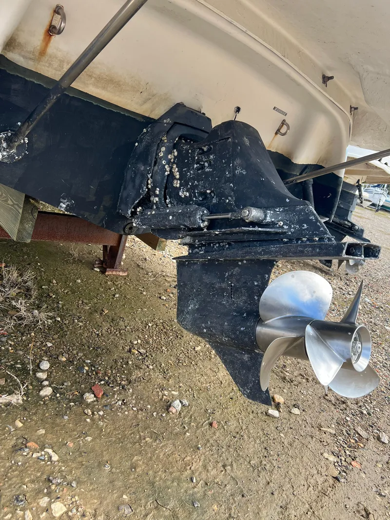 Slide: The Image of 2003 Four Winns 268 Vista boat propeller and stern drive with barnacles. - 41