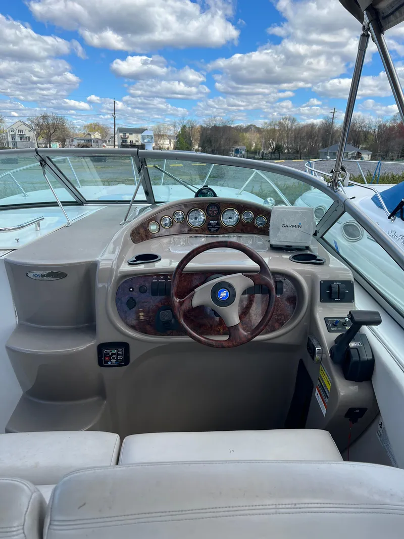 Slide: The Image of 2003 Four Winns 268 Vista boat helm with Garmin navigation system. - 7
