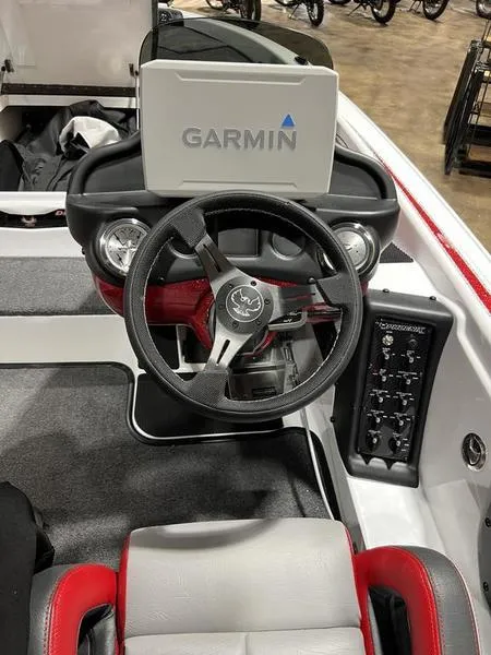 Slide: The Image of 2024 Phoenix 819 Pro boat dashboard with Garmin navigation system. - 4