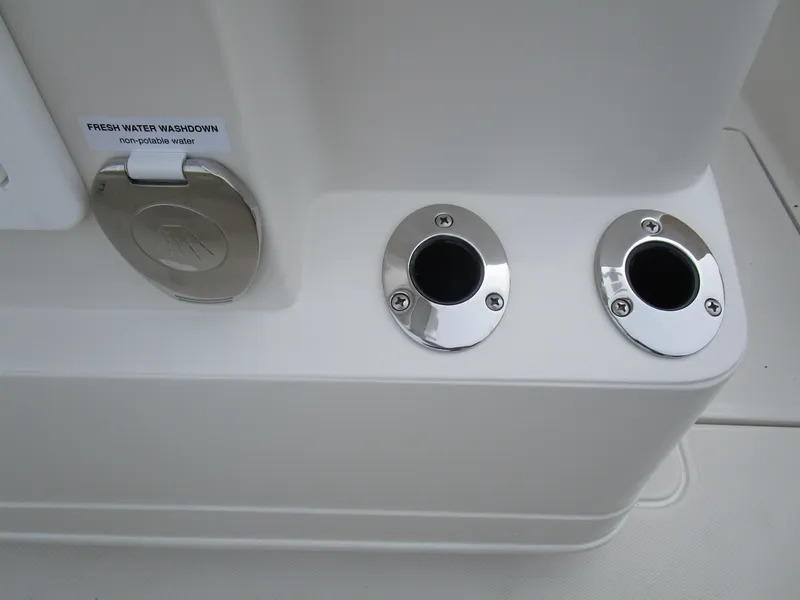 Slide: The Image of 2024 Ranger 2360 Bay boat fresh water washdown and rod holders. - 15