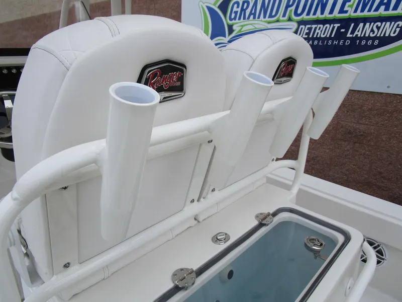 Slide: The Image of 2024 Ranger 2360 Bay boat with rod holders and livewell. - 16