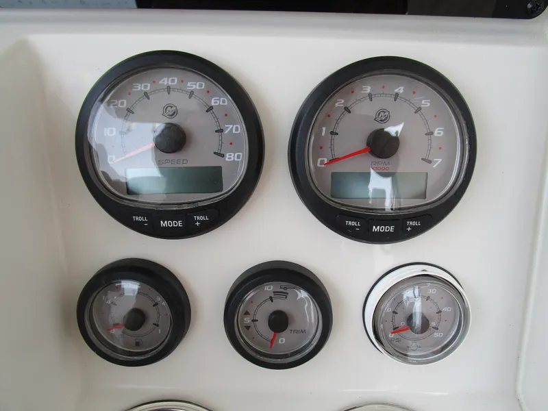 Slide: The Image of Close-up of 2024 Ranger 2360 Bay boat dashboard gauges. - 23