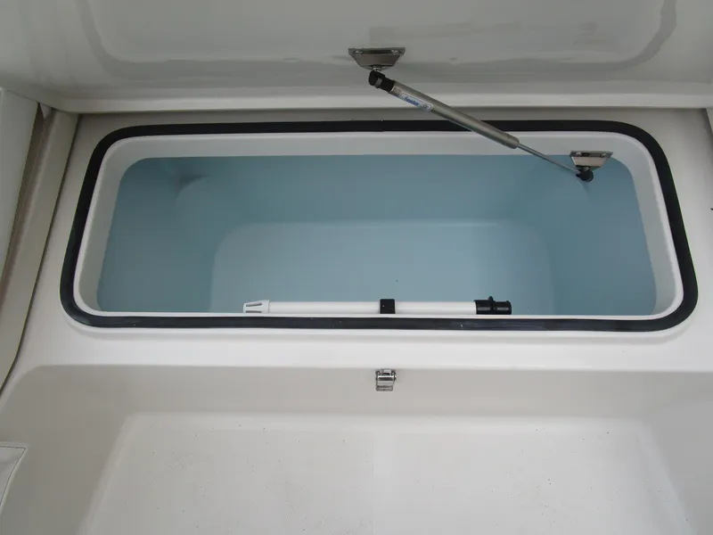 Slide: The Image of Open storage compartment of 2024 Ranger 2360 Bay boat. - 26