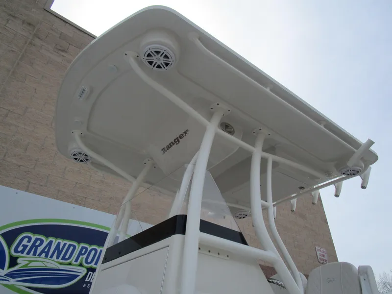 Slide: The Image of 2024 Ranger 2360 Bay boat with T-top and speakers at Grand Pointe Marina. - 35