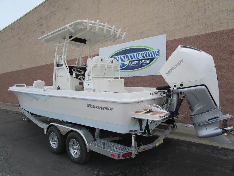 Slide: The Image of 2024 Ranger 2360 Bay boat with Mercury outboard motor at Grand Pointe Marina. - 4