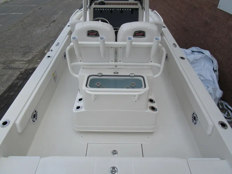 Slide: The Image of 2024 Ranger 2360 Bay boat interior with seating and storage compartments. - 7