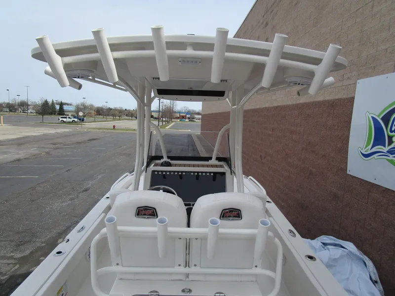 Slide: The Image of 2024 Ranger 2360 Bay boat with T-top and rod holders. - 8