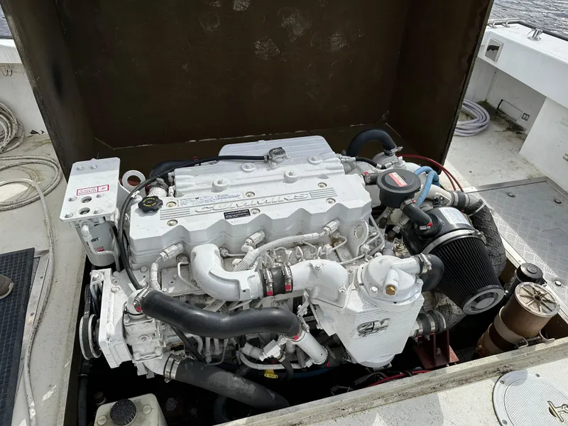 Slide: The Image of Engine of 2016 Custom Broad Creek 32 Downeast boat, showcasing detailed components and layout. - 18