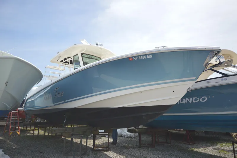 The Image of 2018 Boston Whaler 330 Outrage boat on display, side view. - 0