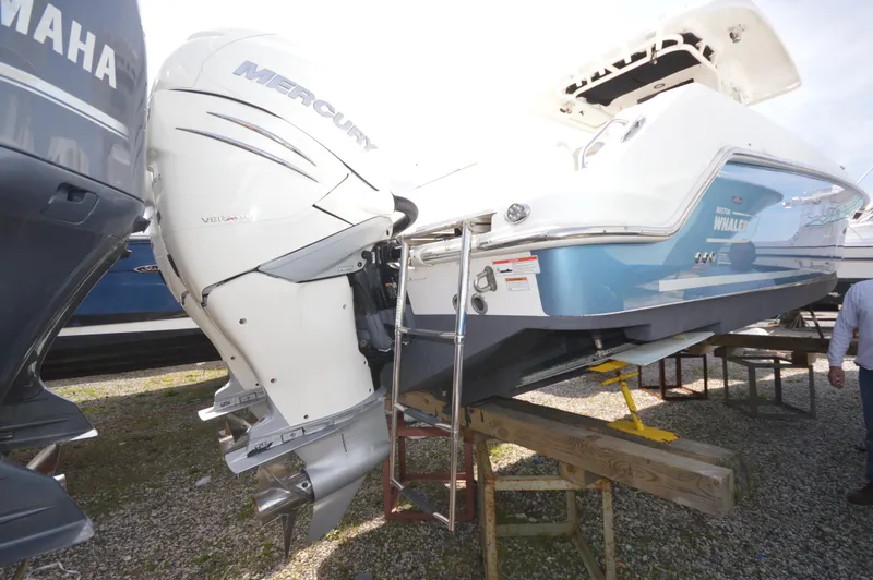 Slide: The Image of 2018 Boston Whaler 330 Outrage with Mercury outboard engines on display. - 30