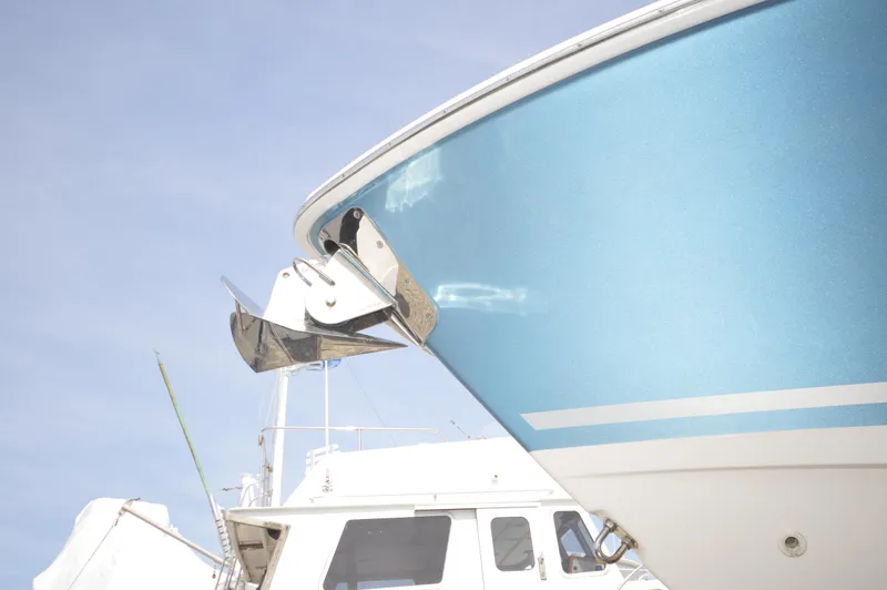 Slide: The Image of Close-up of 2018 Boston Whaler 330 Outrage boat bow with anchor. - 5