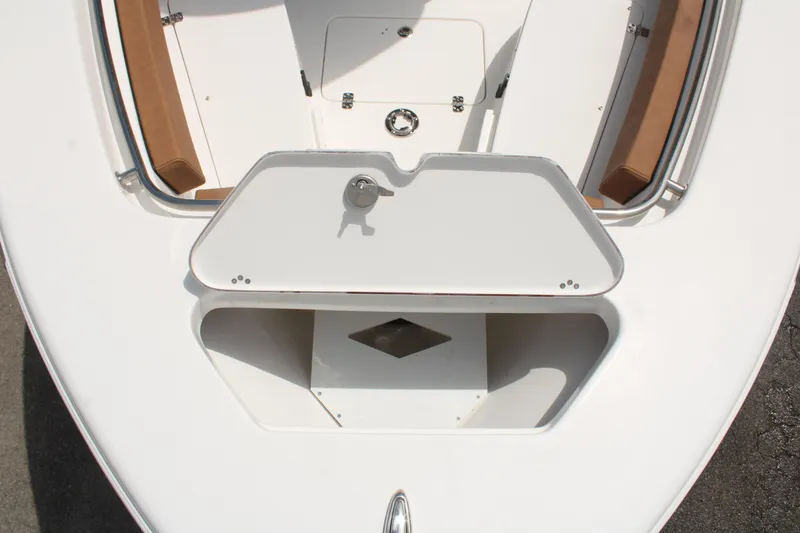 Slide: The Image of 2024 Sea Pro 222 boat storage compartment with open hatch. - 15