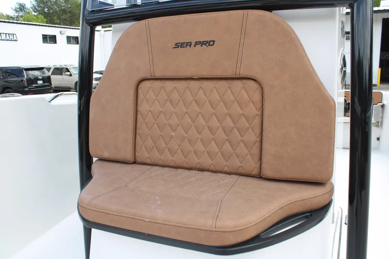 Slide: The Image of 2024 Sea Pro 222 boat seat with brown upholstery. - 18
