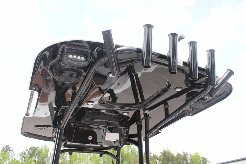 Slide: The Image of 2024 Sea Pro 222 boat's black T-top with rod holders and LED lights. - 24