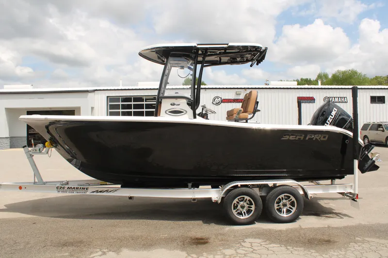 Slide: The Image of 2024 Sea Pro 222 boat on a trailer, side view. - 3