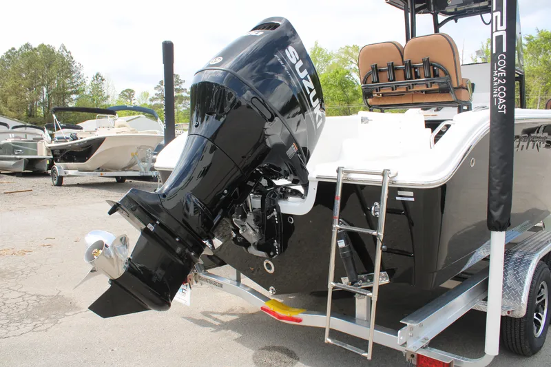 Slide: The Image of 2024 Sea Pro 222 boat with Suzuki outboard motor on trailer. - 5