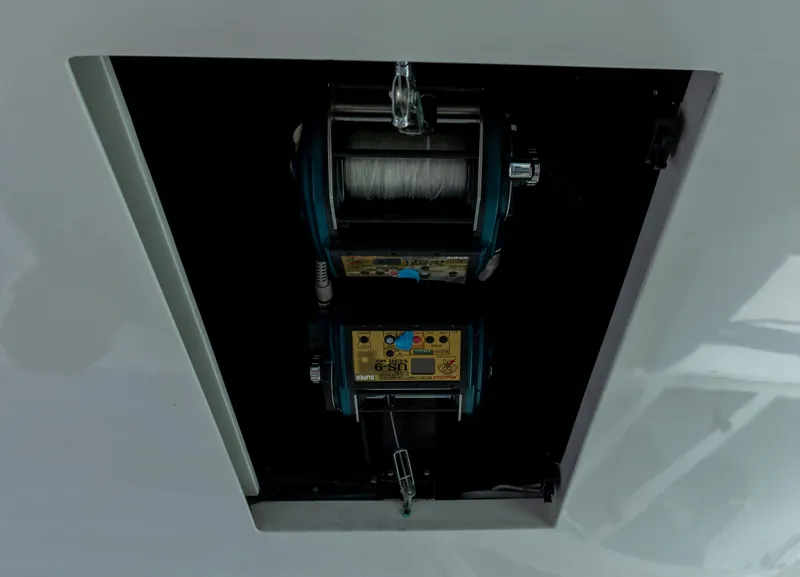 Slide: The Image of Electric fishing reel on a 2008 Cabo 38 Express boat. - 14