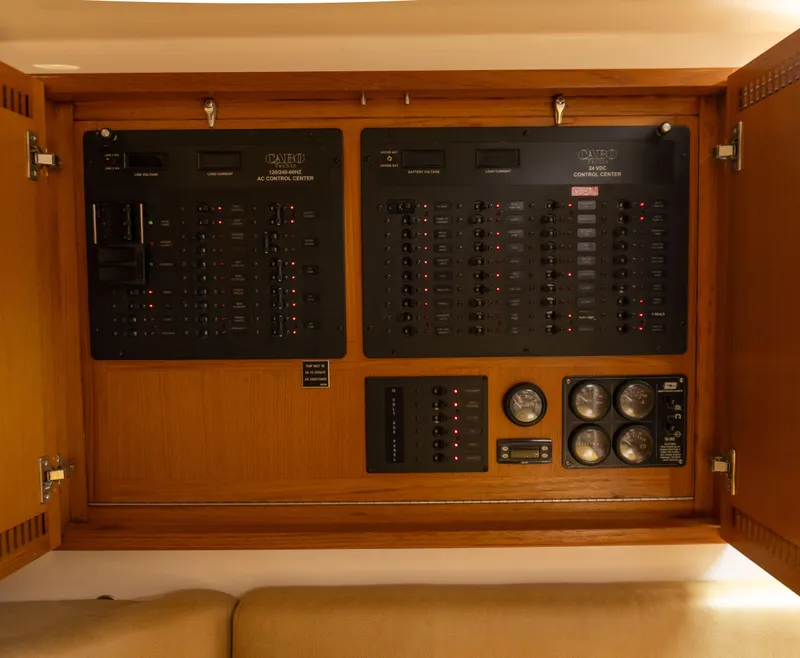 Slide: The Image of Electrical control panel of a 2008 Cabo 38 Express boat. - 19
